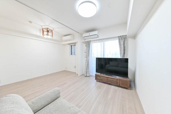 約11.6帖のリビング・ダイニング・キッチンと約4.0帖の洋室1