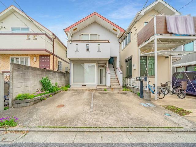 現地（古家あり）：写真左の戸建