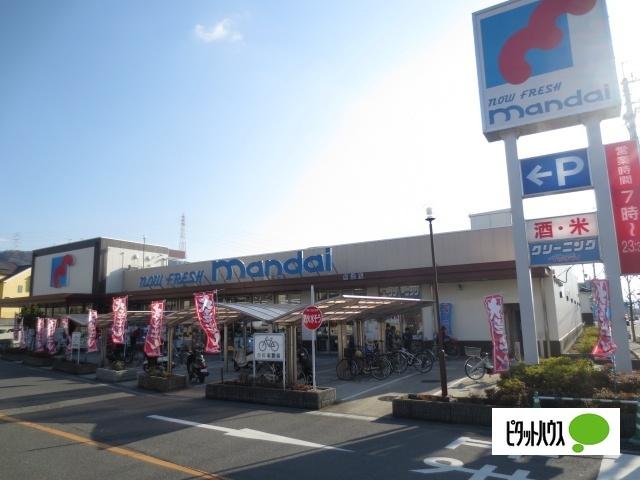 万代倉治店：251m