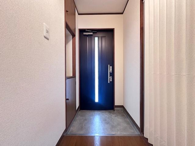 スリーハイツ 玄関