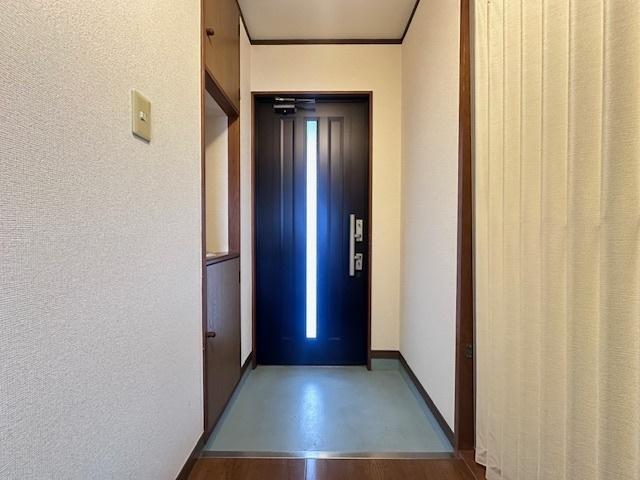 スリーハイツ 玄関