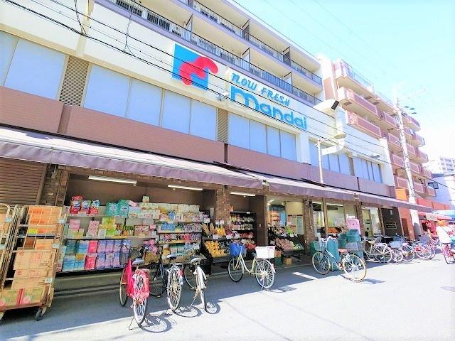 万代塚本店：195m