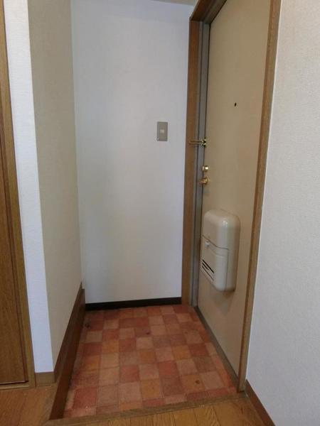 タットディナスティ西本町（503） 玄関