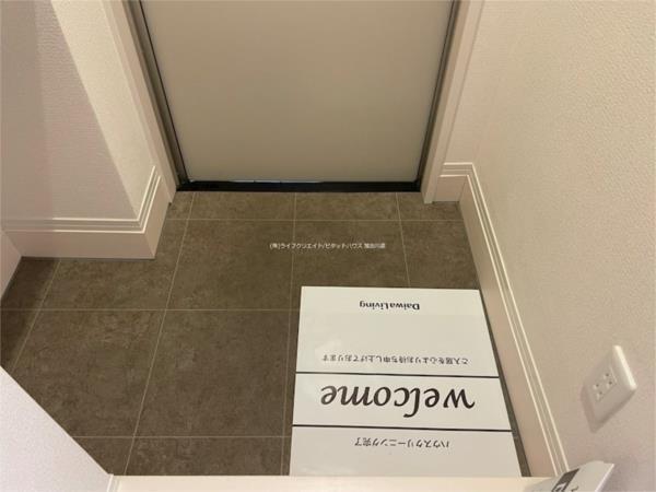 カーサ・フェリーチェ新在家 玄関