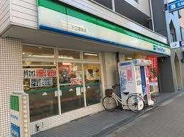 ファミリーマート十三塚本店：241m