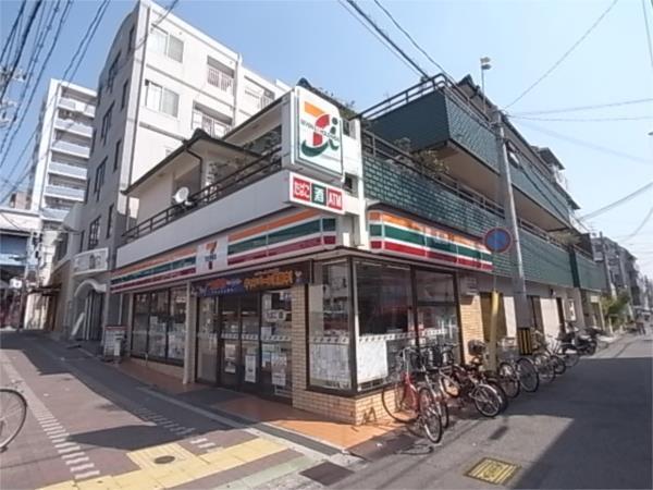 セブンイレブン 神戸新在家駅前：280m