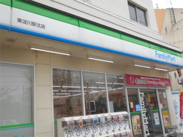 ファミリーマート 東淀川駅北店：432m