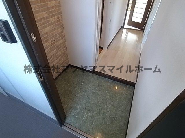 スタンドアップ忍ケ丘（301） 玄関