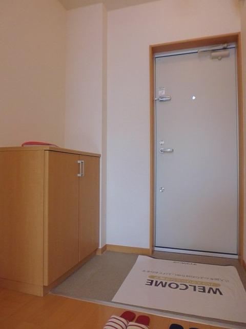 メロンハウス鶴羽田（210） 玄関