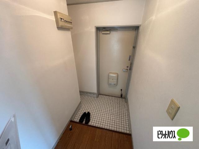 プレジオ王塚台 玄関
