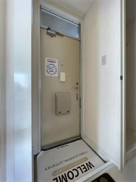 プレジール高広（101） 玄関
