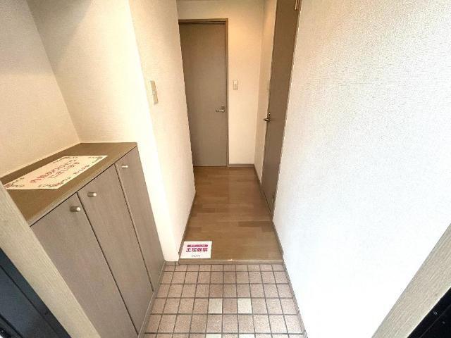 ソレイユ段上 玄関