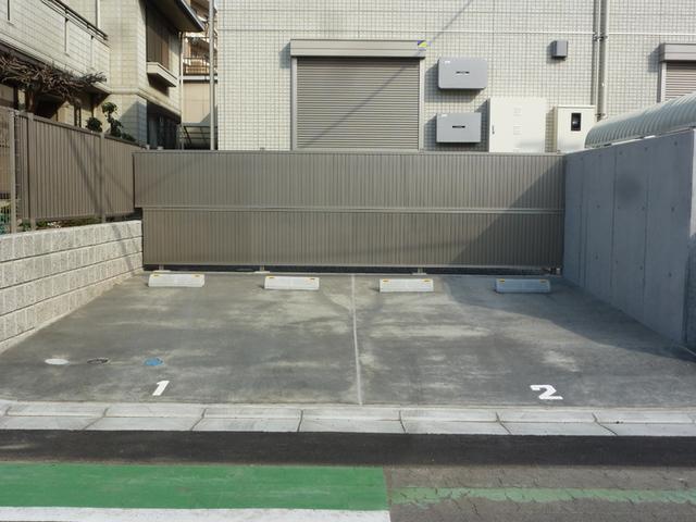 メゾンソレイユ朝日（102） 駐車場