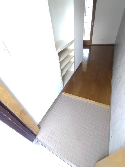アルファイン高知（302） 玄関