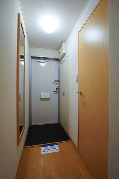 レオネクスト倉富 玄関