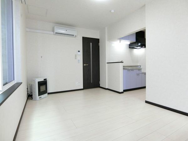 札幌市厚別区厚別西三条アパート リビング