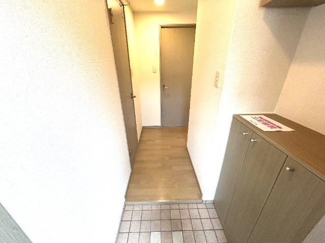 ソレイユ段上 玄関