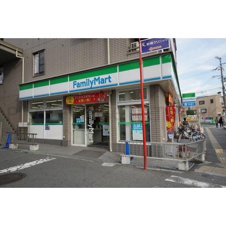 吹田市山手町マンション 周辺環境写真1 ファミリーマート豊津駅前店：145m