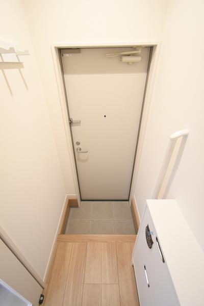 ウィズキャット三萩野 玄関