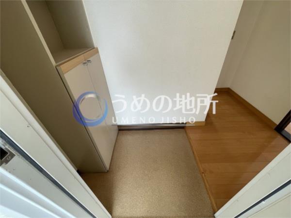 上津ｺｰﾎﾟE棟（202） 玄関