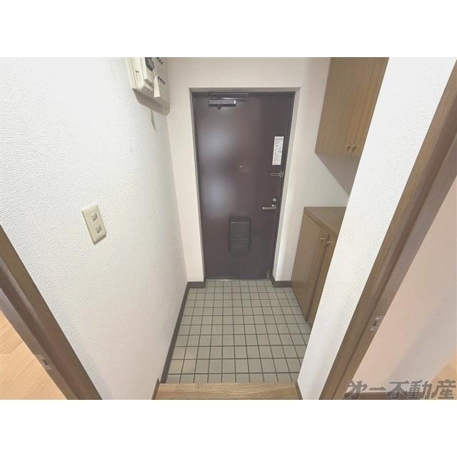 コムラーデ八幡（504） 玄関