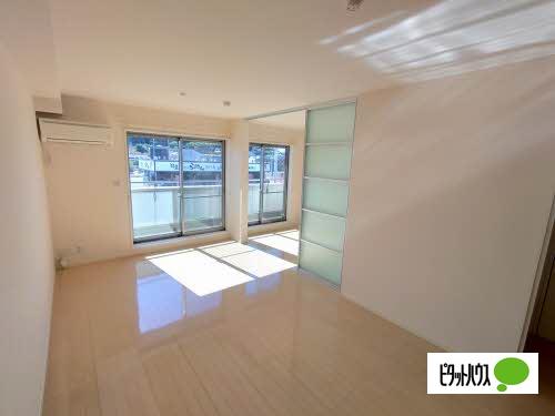 グランマストアベニューA棟（203） リビング