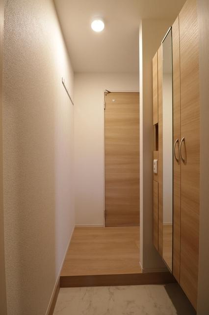 グランドコート堤町（105） 玄関