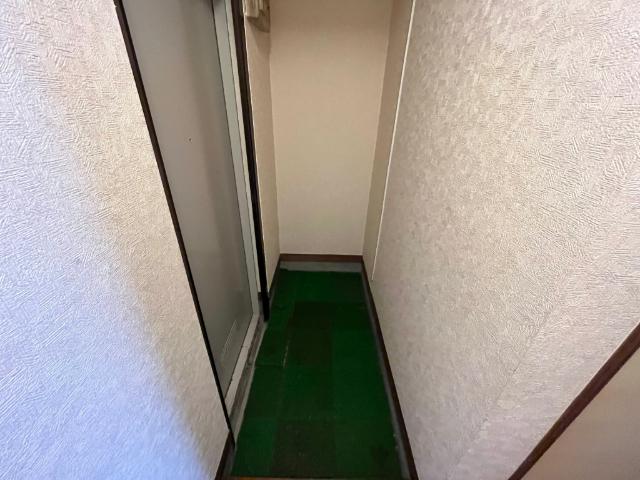 とみながビル（302） 玄関