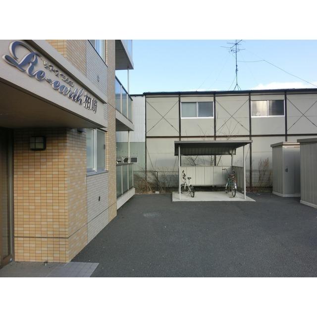 RE・EARTHマンション柏崎（301） 駐車場