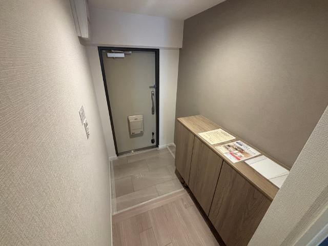 ユニライフ北大阪弐号棟 玄関
